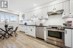 The Stylish Kitchen Showcases Quartz Countertops -