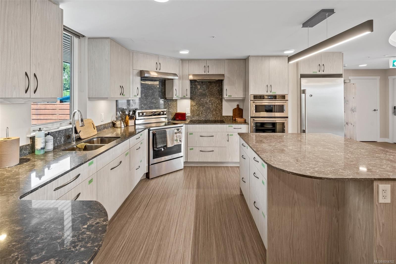 203-6609 Goodmere Rd, Sooke, BC - Indoor Photo Showing Kitchen With Stainless Steel Kitchen With Double Sink With Upgraded Kitchen