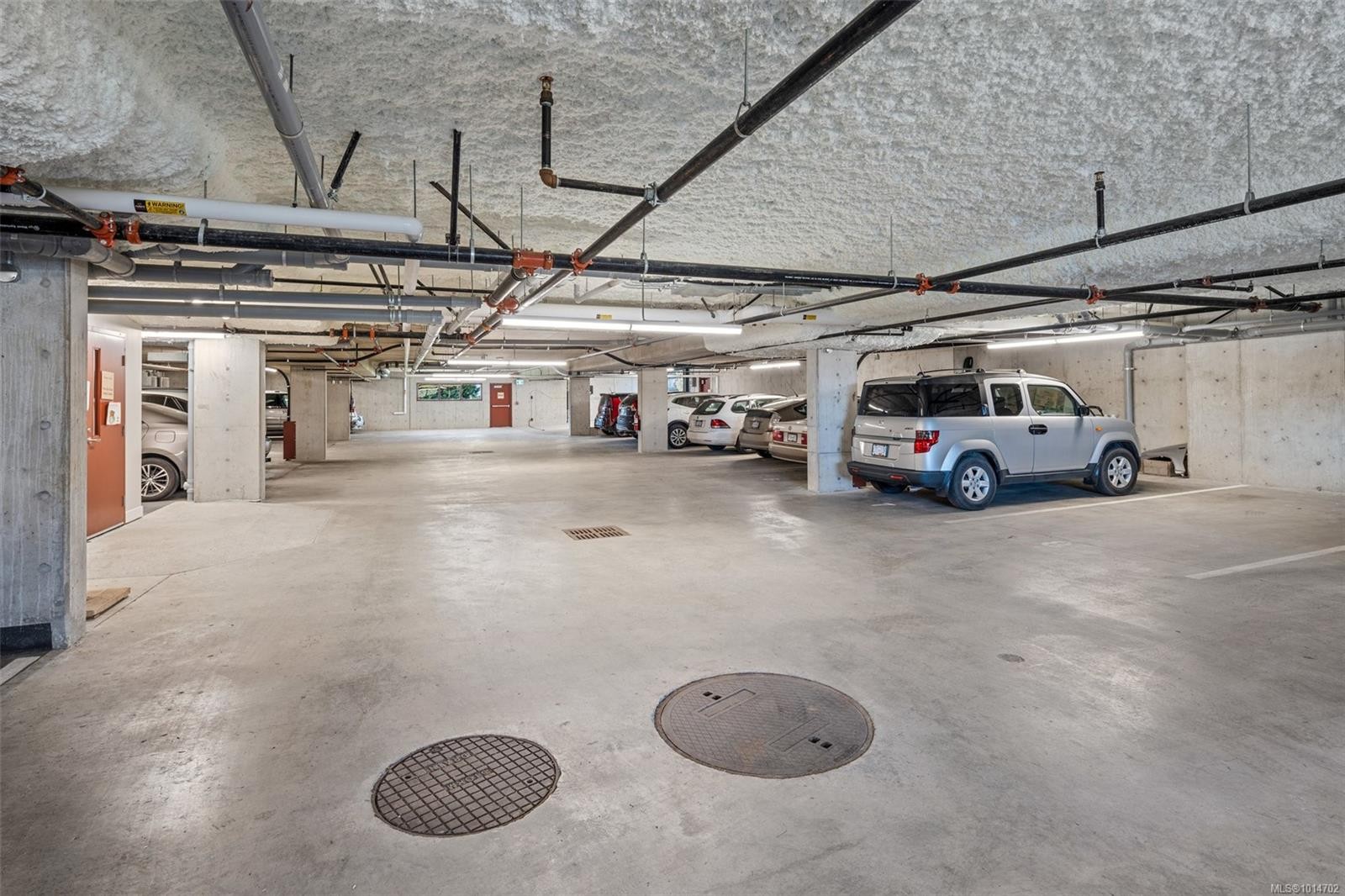 203-6609 Goodmere Rd, Sooke, BC - Indoor Photo Showing Garage