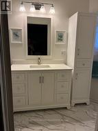 New cupboards, sink, mirror -