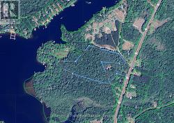 Aerial View - Level & Well Treed Development Lands -