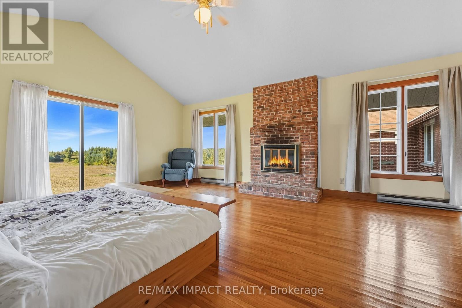 1530 10 Line W, Trent Hills, ON - Indoor Photo Showing Bedroom With Fireplace