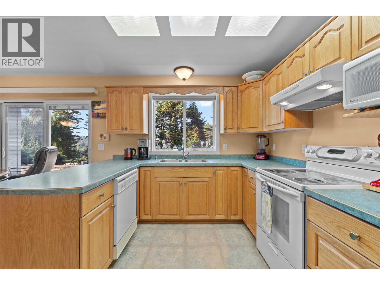 760 Mobley Road, Tappen, BC - Indoor Photo Showing Kitchen With Double Sink