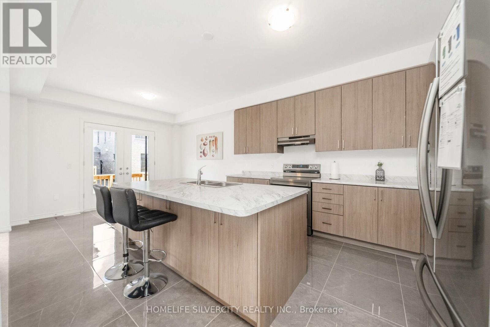 26 Sassafrass Road, Springwater, ON - Indoor Photo Showing Kitchen