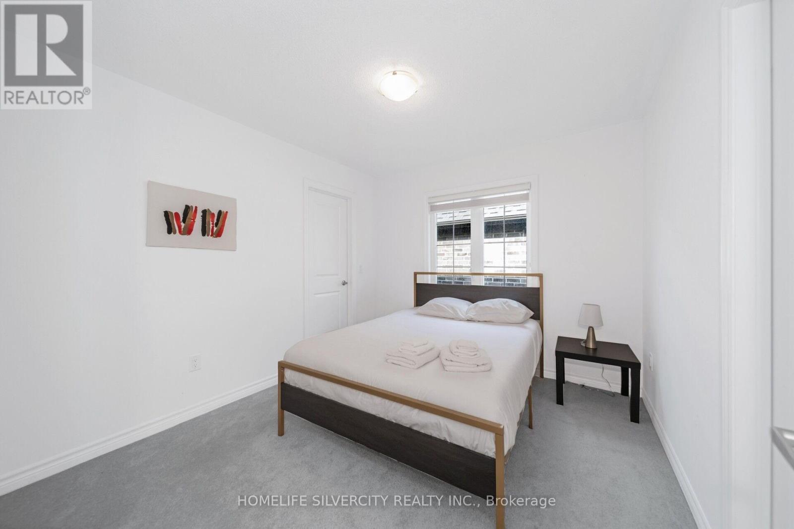 26 Sassafrass Road, Springwater, ON - Indoor Photo Showing Bedroom