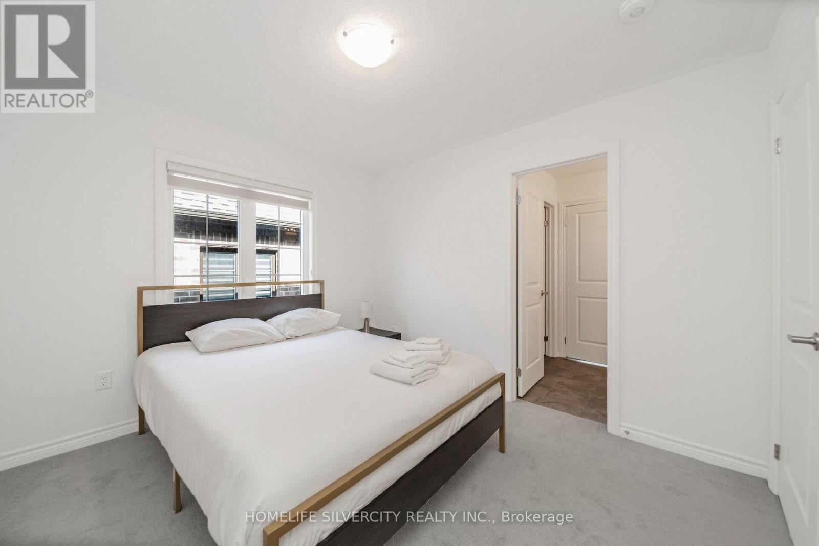 26 Sassafrass Road, Springwater, ON - Indoor Photo Showing Bedroom