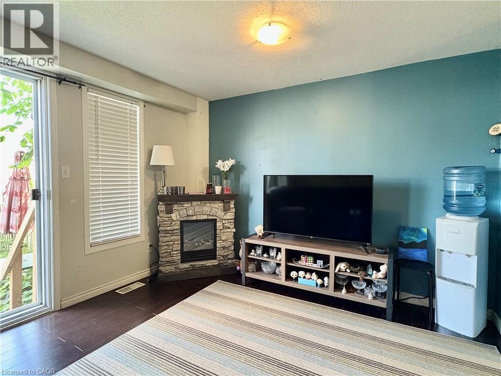 38 Max Becker Drive, Kitchener, ON - Indoor Photo Showing Living Room With Fireplace