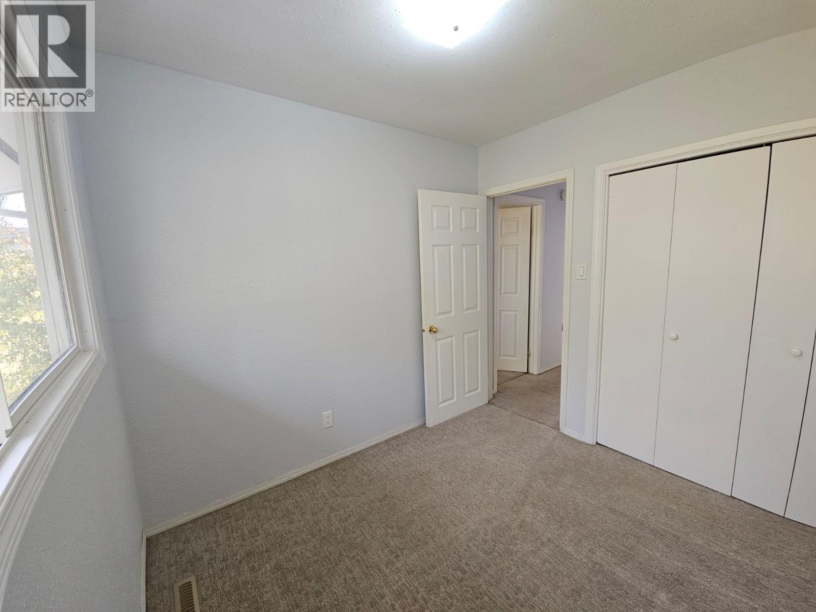 140-5100 53 Street Sw, Chetwynd, BC - Indoor Photo Showing Other Room