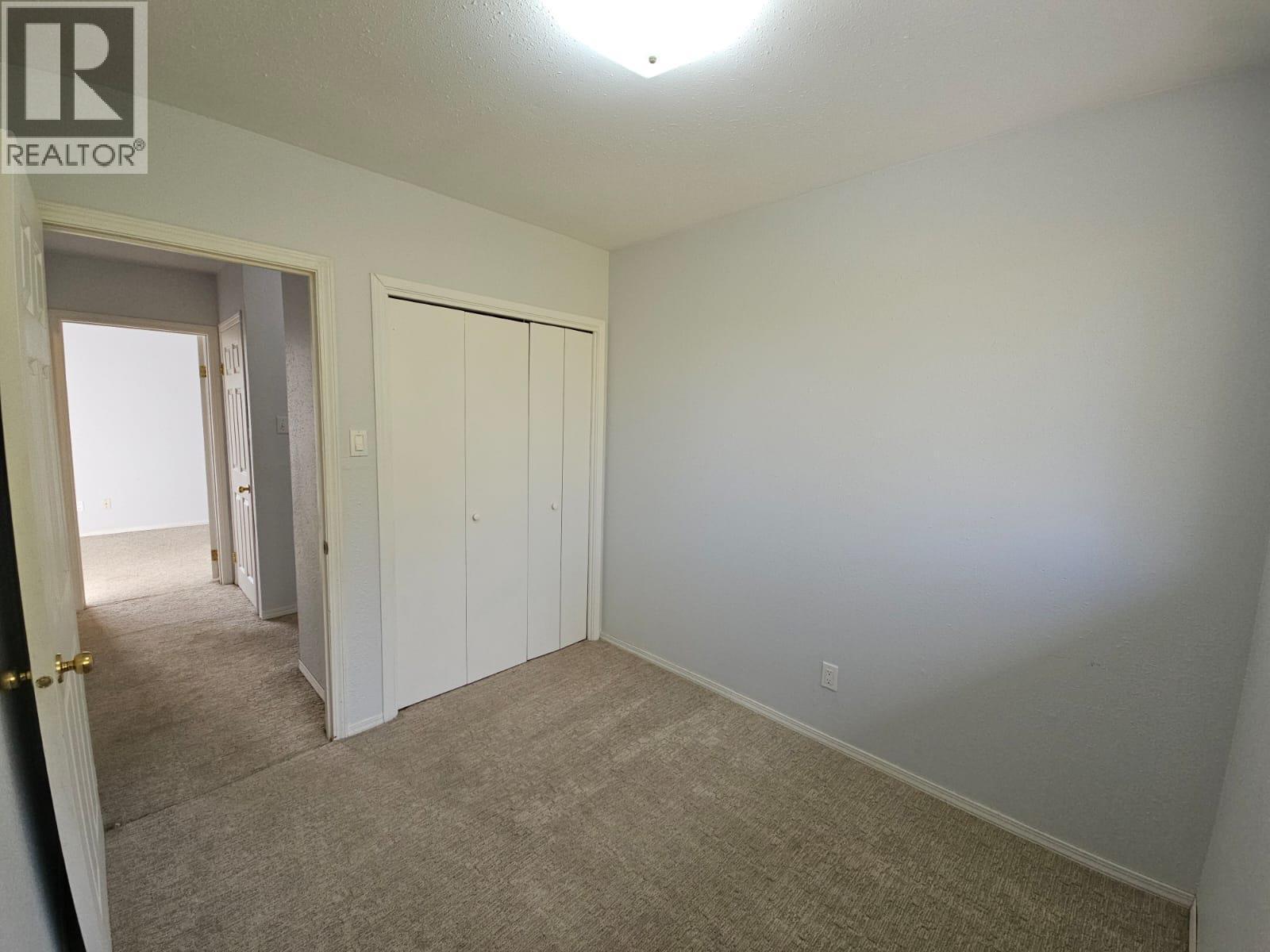 140-5100 53 Street Sw, Chetwynd, BC - Indoor Photo Showing Other Room