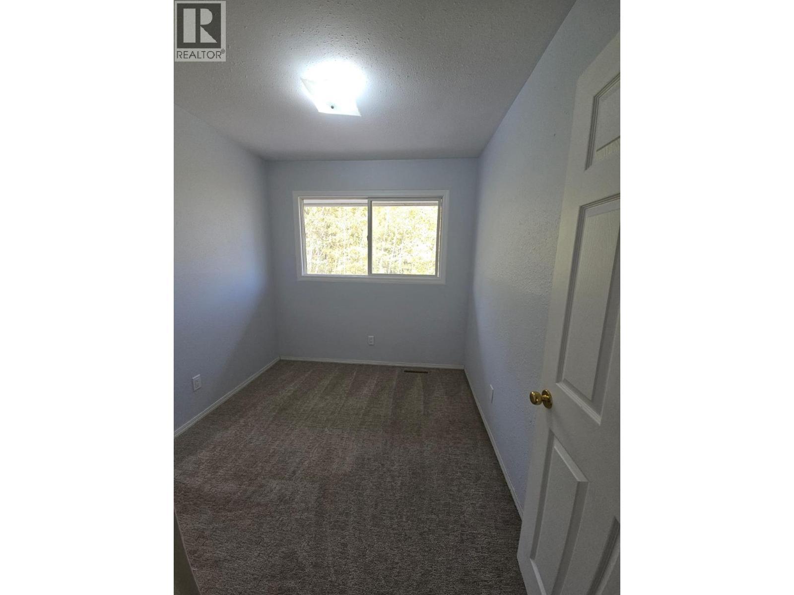 140-5100 53 Street Sw, Chetwynd, BC - Indoor Photo Showing Other Room