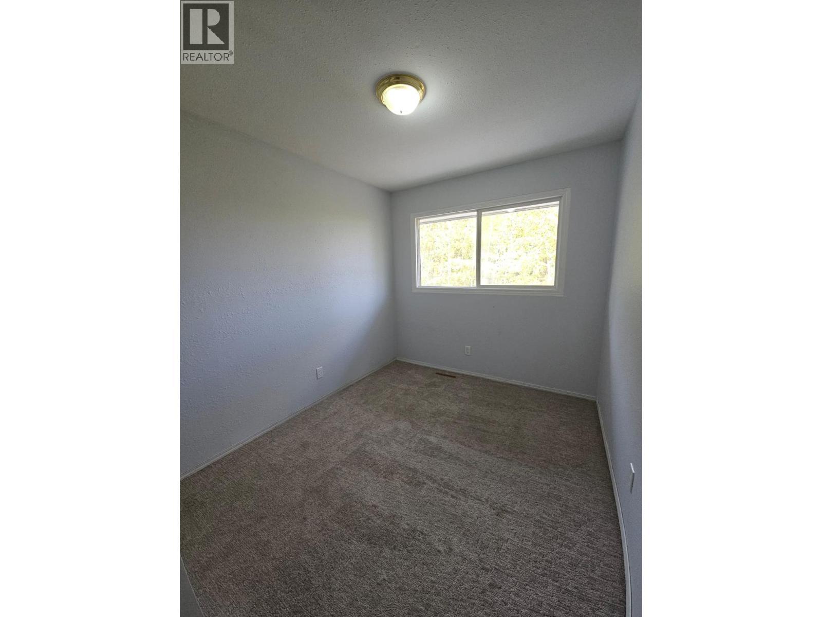 140-5100 53 Street Sw, Chetwynd, BC - Indoor Photo Showing Other Room