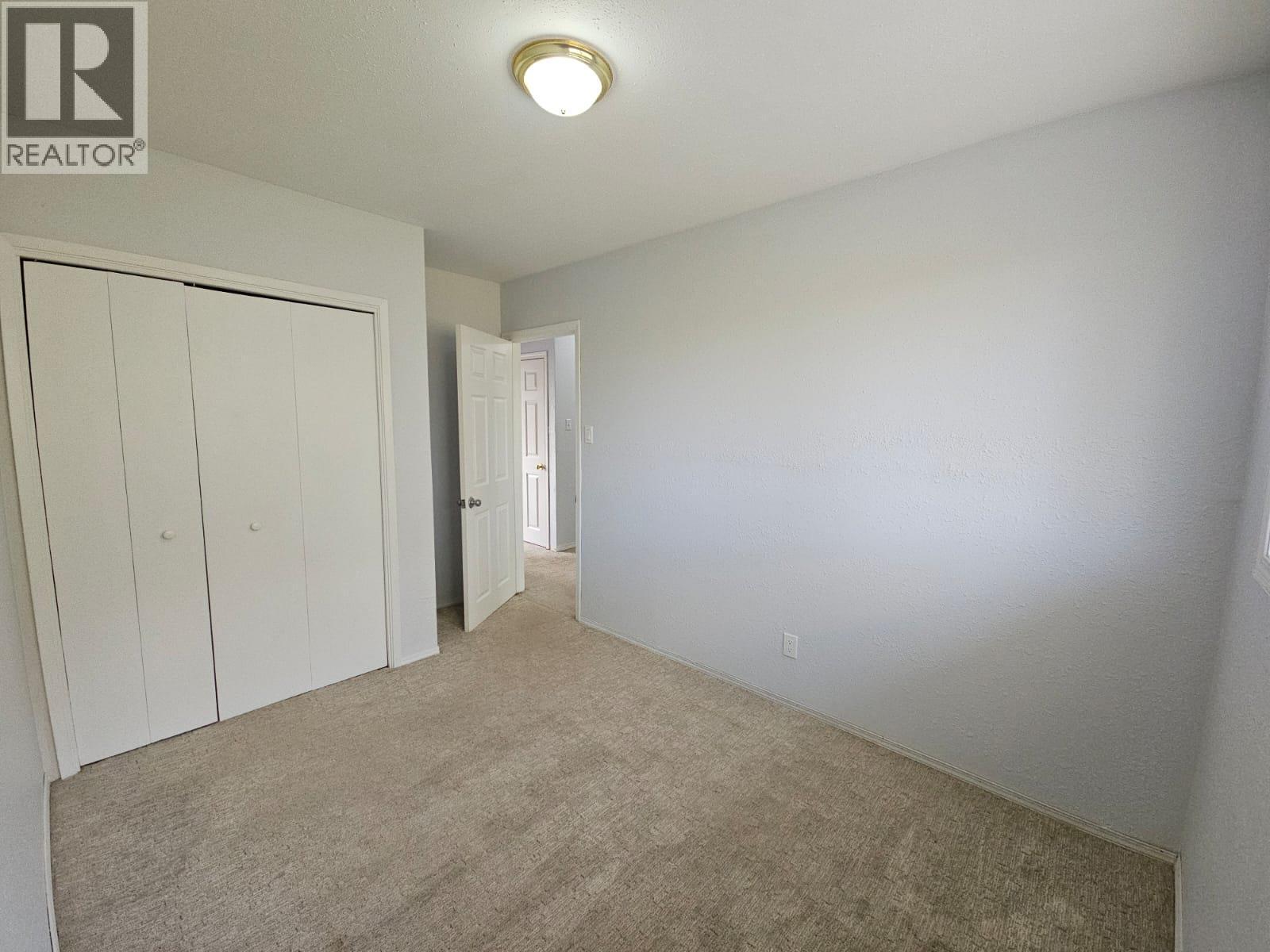 140-5100 53 Street Sw, Chetwynd, BC - Indoor Photo Showing Other Room