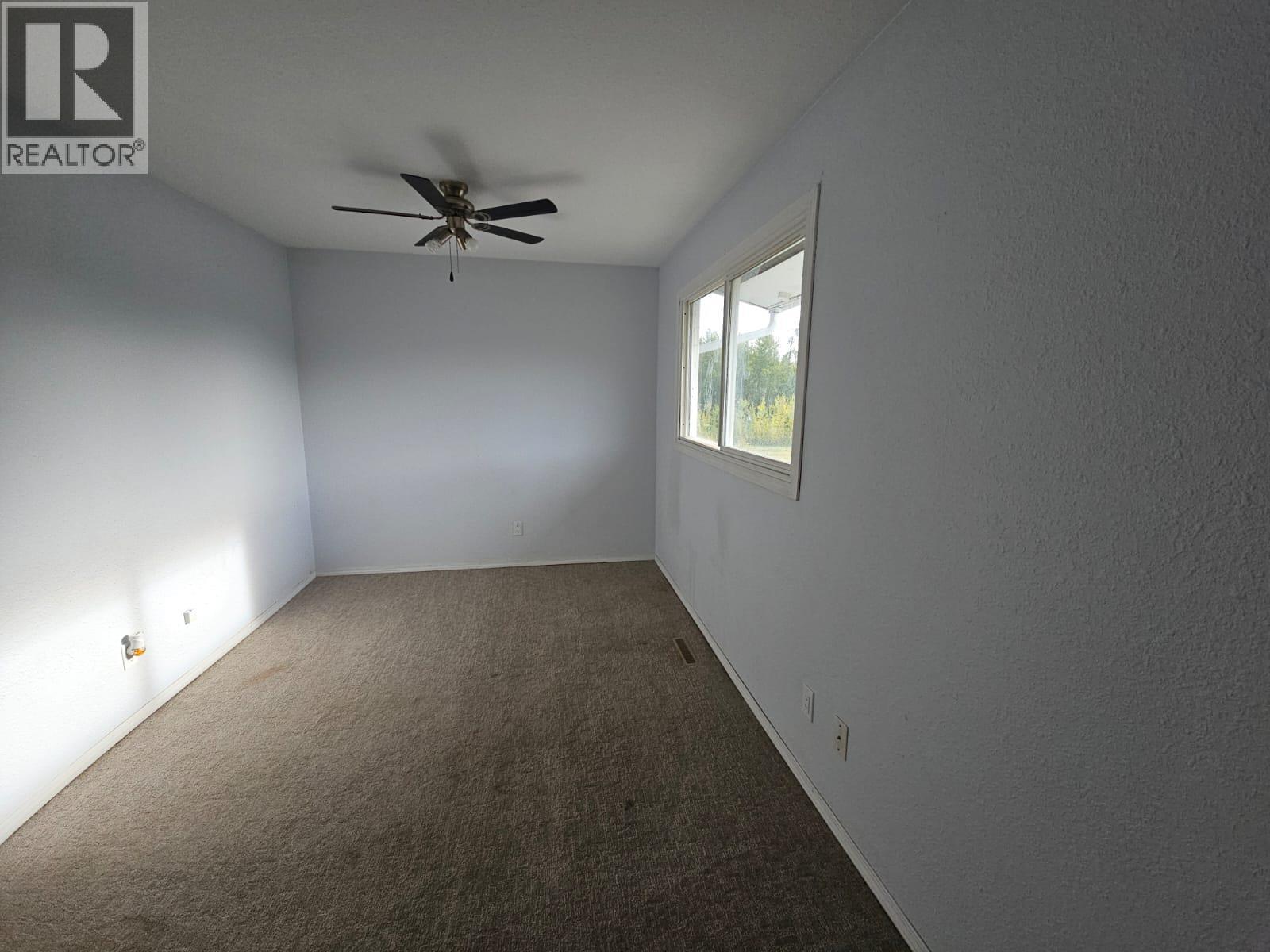 140-5100 53 Street Sw, Chetwynd, BC - Indoor Photo Showing Other Room