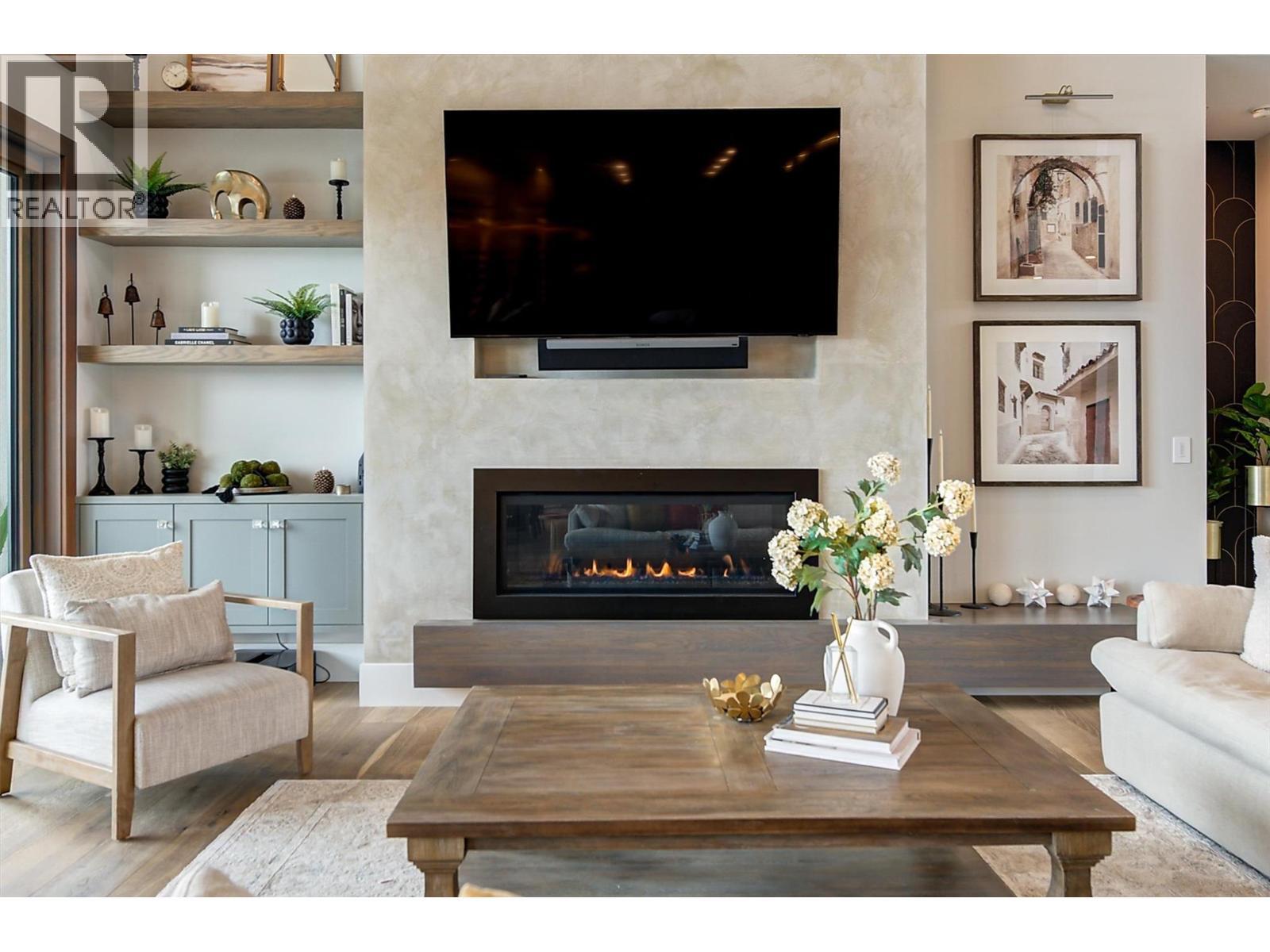 1612 Vincent Place, Kelowna, BC - Indoor Photo Showing Living Room With Fireplace