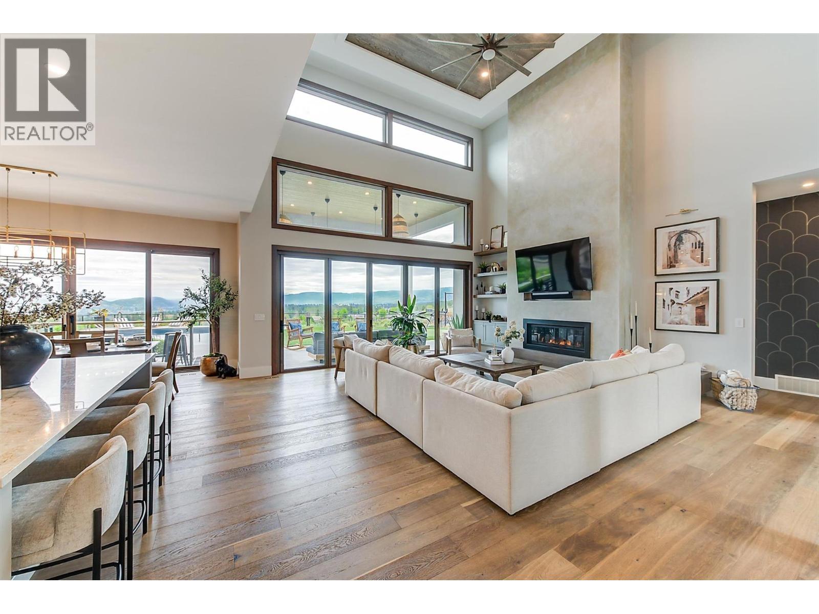 1612 Vincent Place, Kelowna, BC - Indoor Photo Showing Living Room With Fireplace