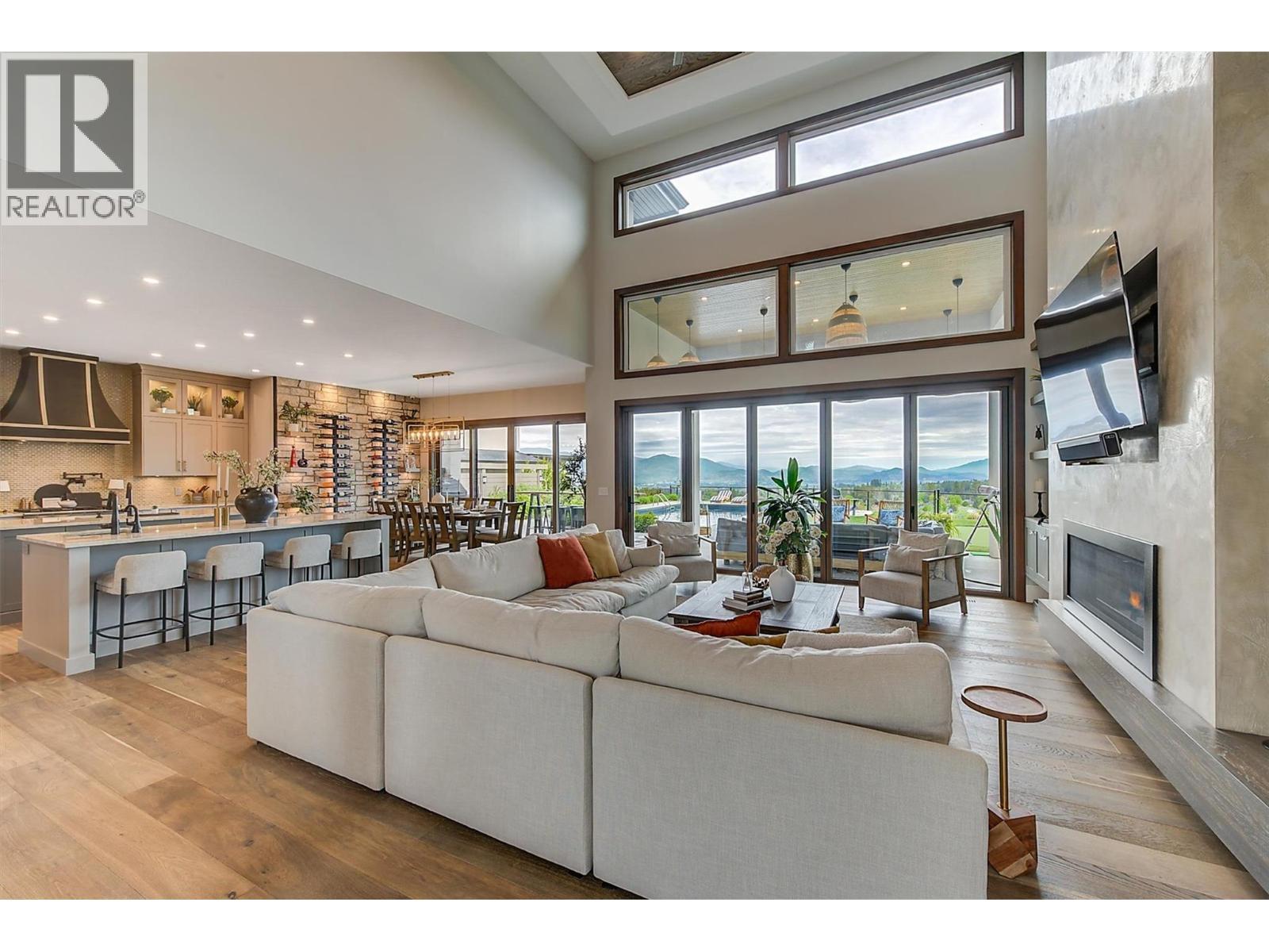 1612 Vincent Place, Kelowna, BC - Indoor Photo Showing Living Room With Fireplace