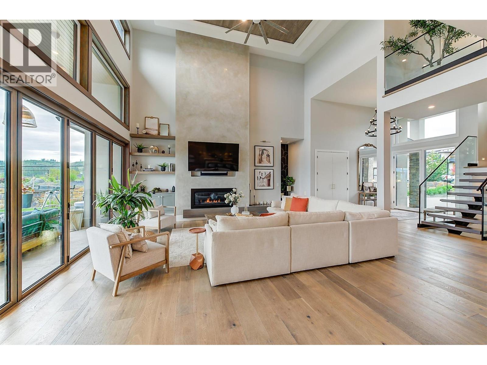 1612 Vincent Place, Kelowna, BC - Indoor Photo Showing Living Room With Fireplace