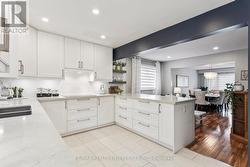 Briht and Renovated kitchen featuring modern look -