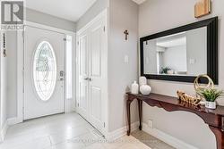 Bright entrance to this home with coats closet -