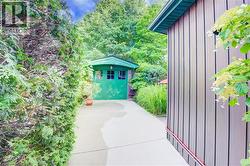 View of patio / terrace featuring an outbuilding -