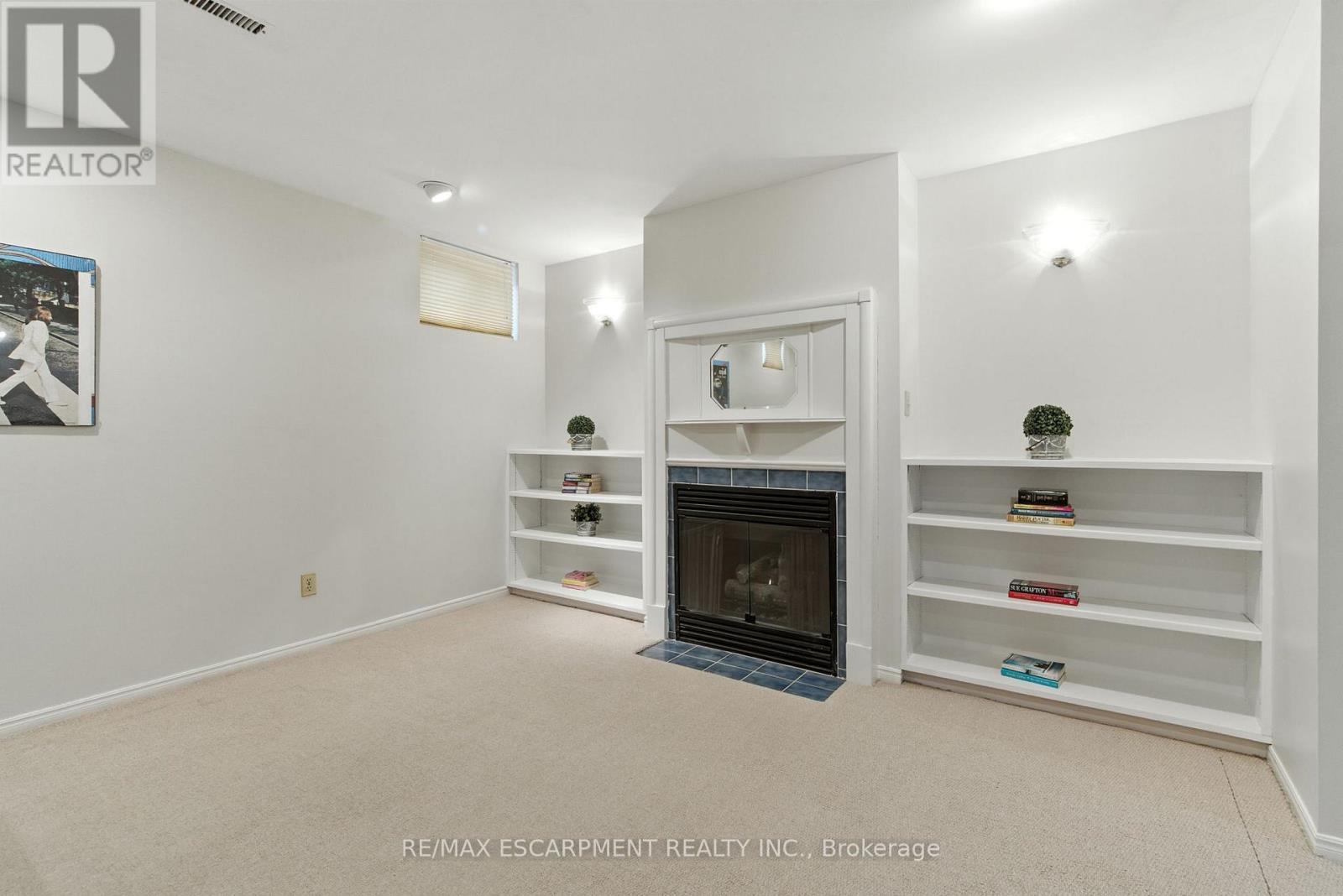 561 Harmony Avenue, Burlington, ON - Indoor Photo Showing Other Room With Fireplace