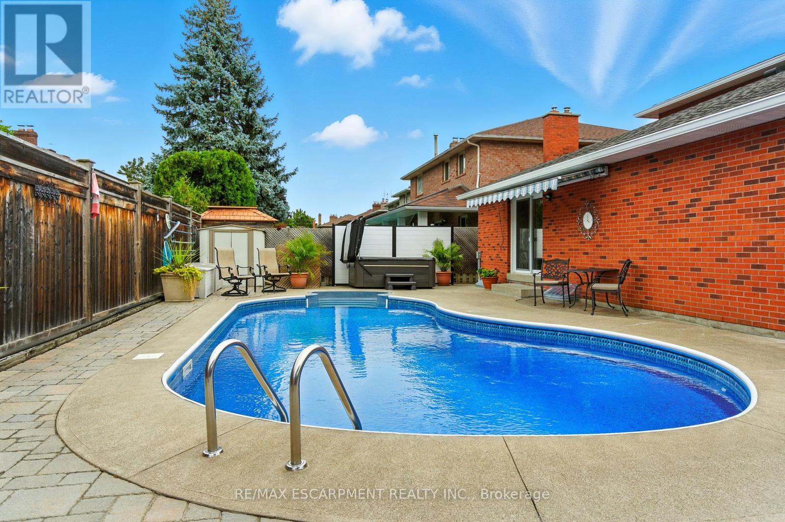 561 Harmony Avenue, Burlington, ON - Outdoor With In Ground Pool With Deck Patio Veranda