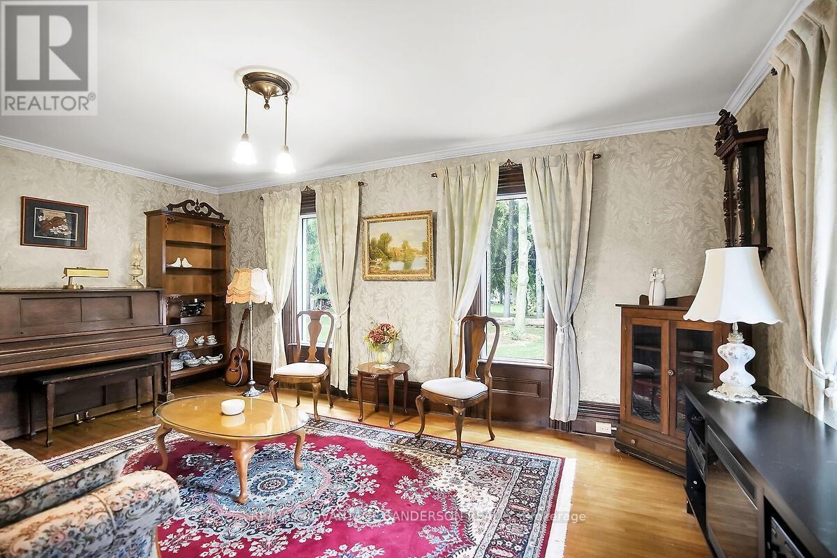 8523 Townsend Line, Lambton Shores (Arkona), ON - Indoor Photo Showing Living Room With Fireplace