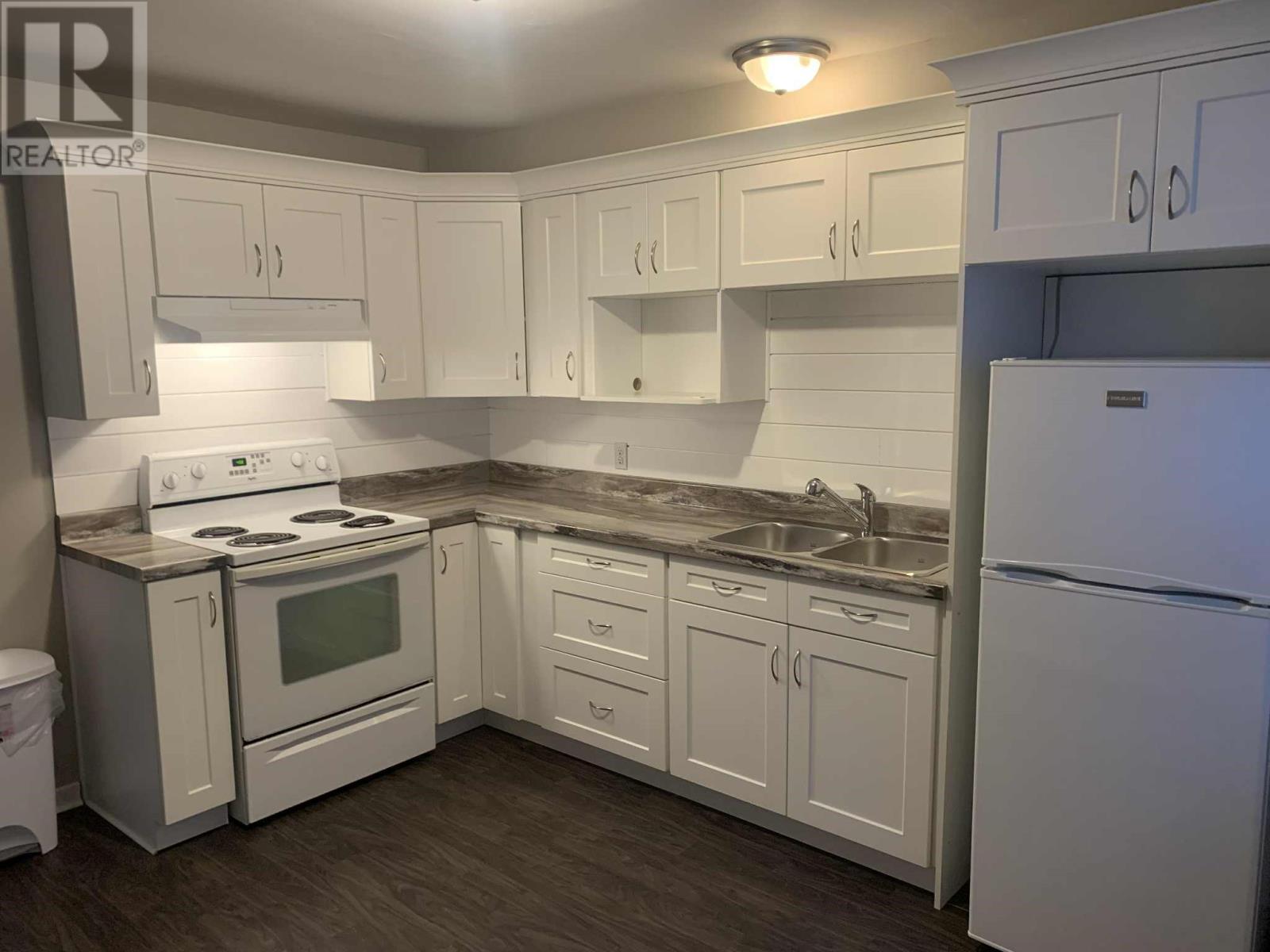 15-21 High Street, Baie Verte, NL - Indoor Photo Showing Kitchen With Double Sink
