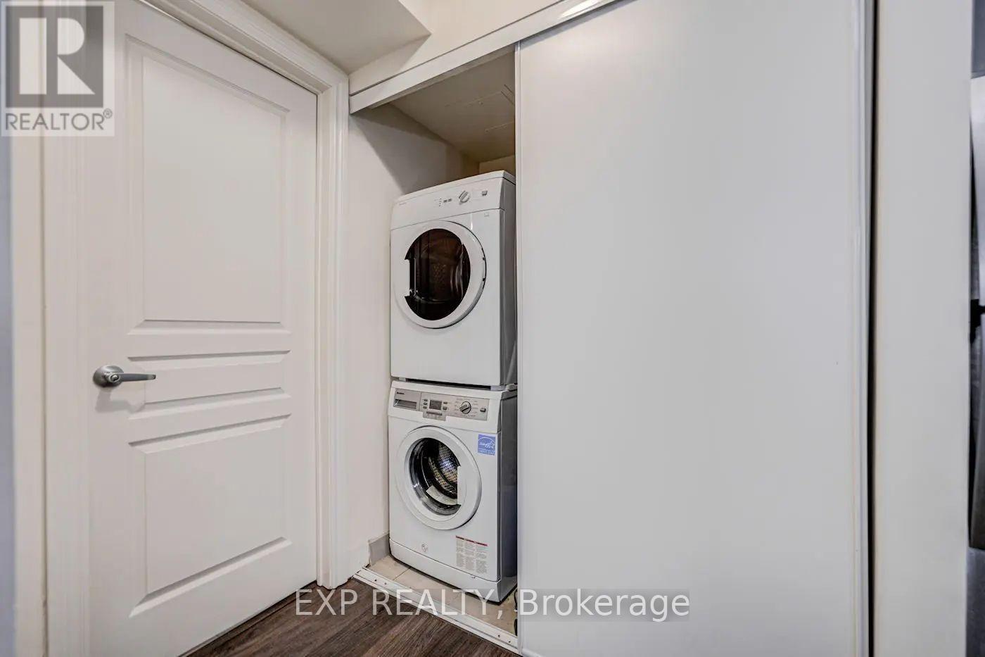 11 - 140 Long Branch Avenue, Toronto, ON - Indoor Photo Showing Laundry Room