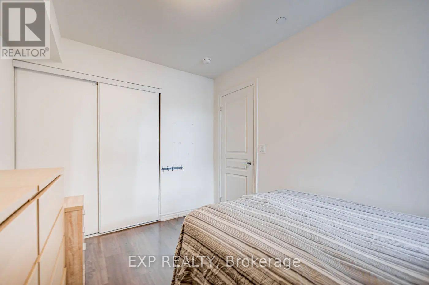 11 - 140 Long Branch Avenue, Toronto, ON - Indoor Photo Showing Bedroom