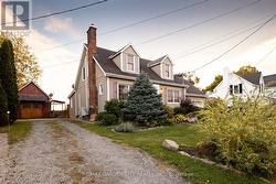 2nd driveway w/ bonus detached garage -