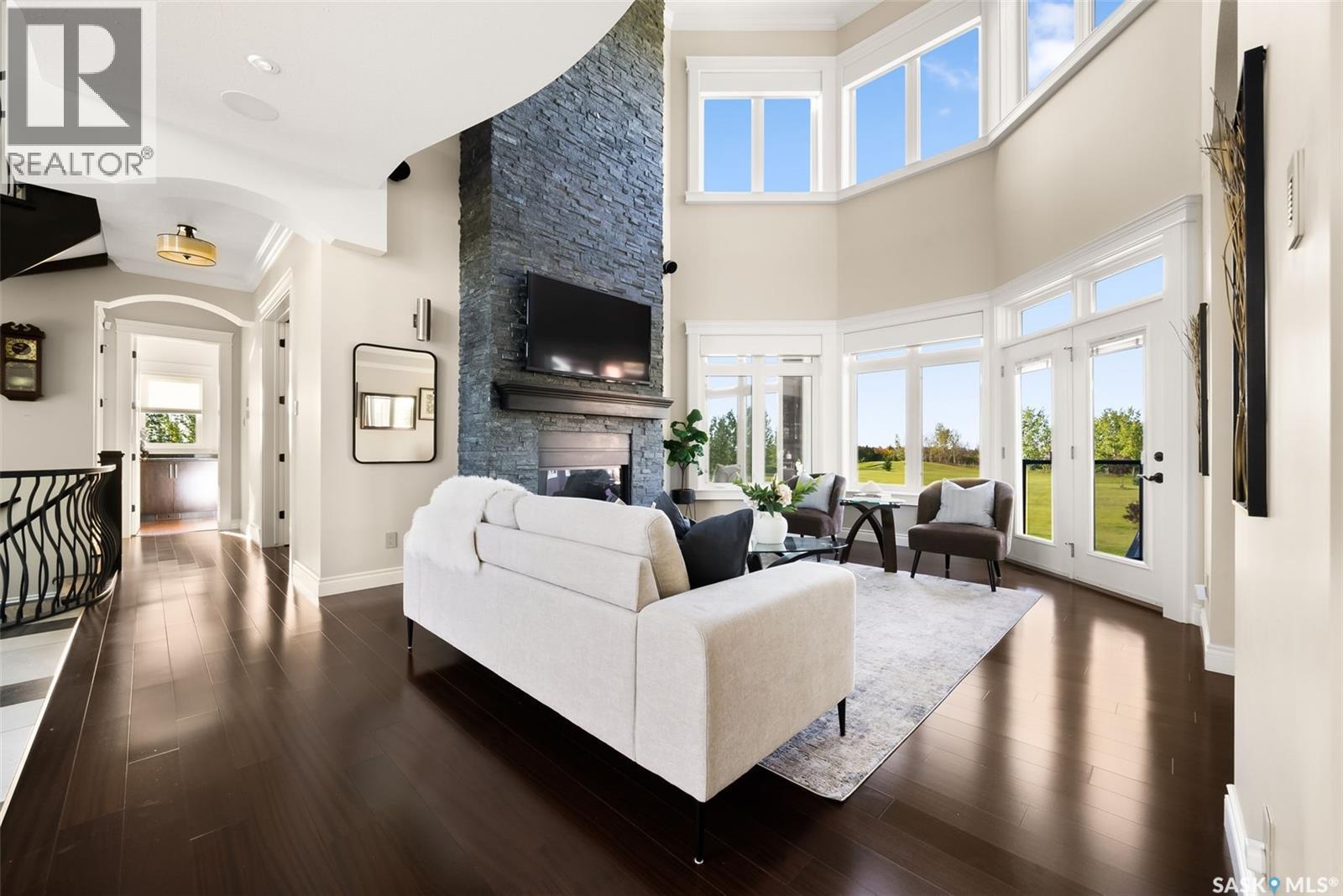 123 Slater Crescent, Edenwold Rm No.158, SK - Indoor Photo Showing Living Room With Fireplace