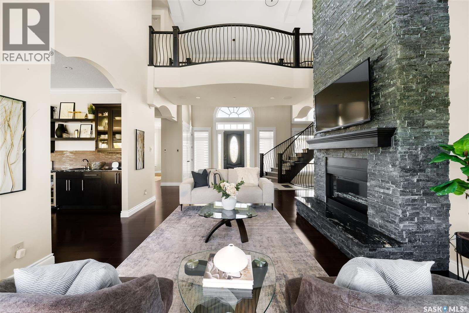 123 Slater Crescent, Edenwold Rm No.158, SK - Indoor Photo Showing Living Room With Fireplace