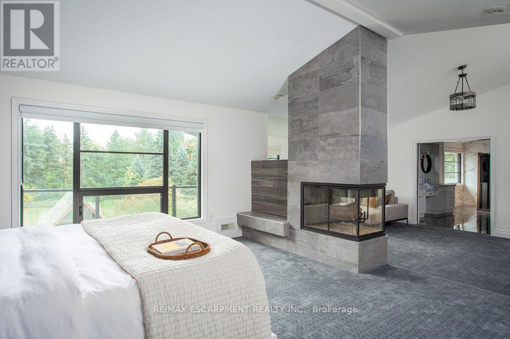 12 Blackberry Place, Hamilton, ON - Indoor Photo Showing Bedroom With Fireplace