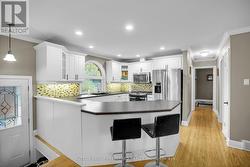Kitchen cupboards recently professionally painted -