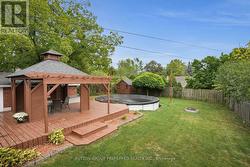Large Fenced yard with huge deck and pool -