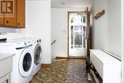 Laundry Room with exit/entrance to back yard -