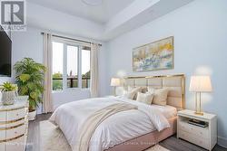 virtually staged Primary Bedroom with ensuite -