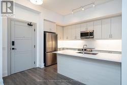 Quartz, Stainless Steel appliances & Breakfast bar -