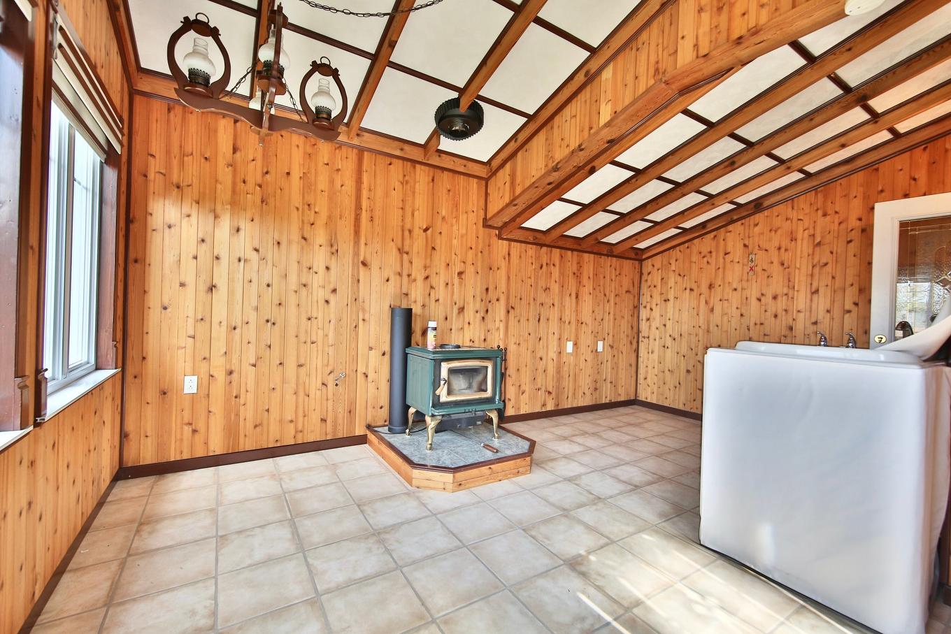 Solarium/Sunroom - 820 Rue Martin, Longueuil (Saint-Hubert), QC - Indoor Photo Showing Other Room With Fireplace