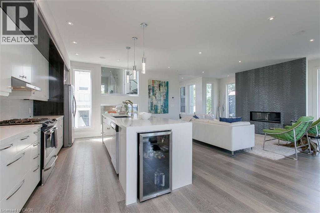 975 Beach Boulevard, Hamilton, ON - Indoor Photo Showing Kitchen With Fireplace With Stainless Steel Kitchen With Upgraded Kitchen