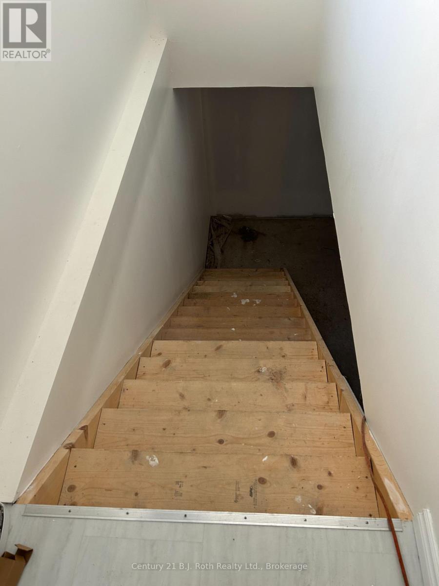 Stairs leading to Basement - 1 Waagosh Miikans Lane W, Christian Island 30 (Beausoleil First Nation), ON - Indoor Photo Showing Other Room