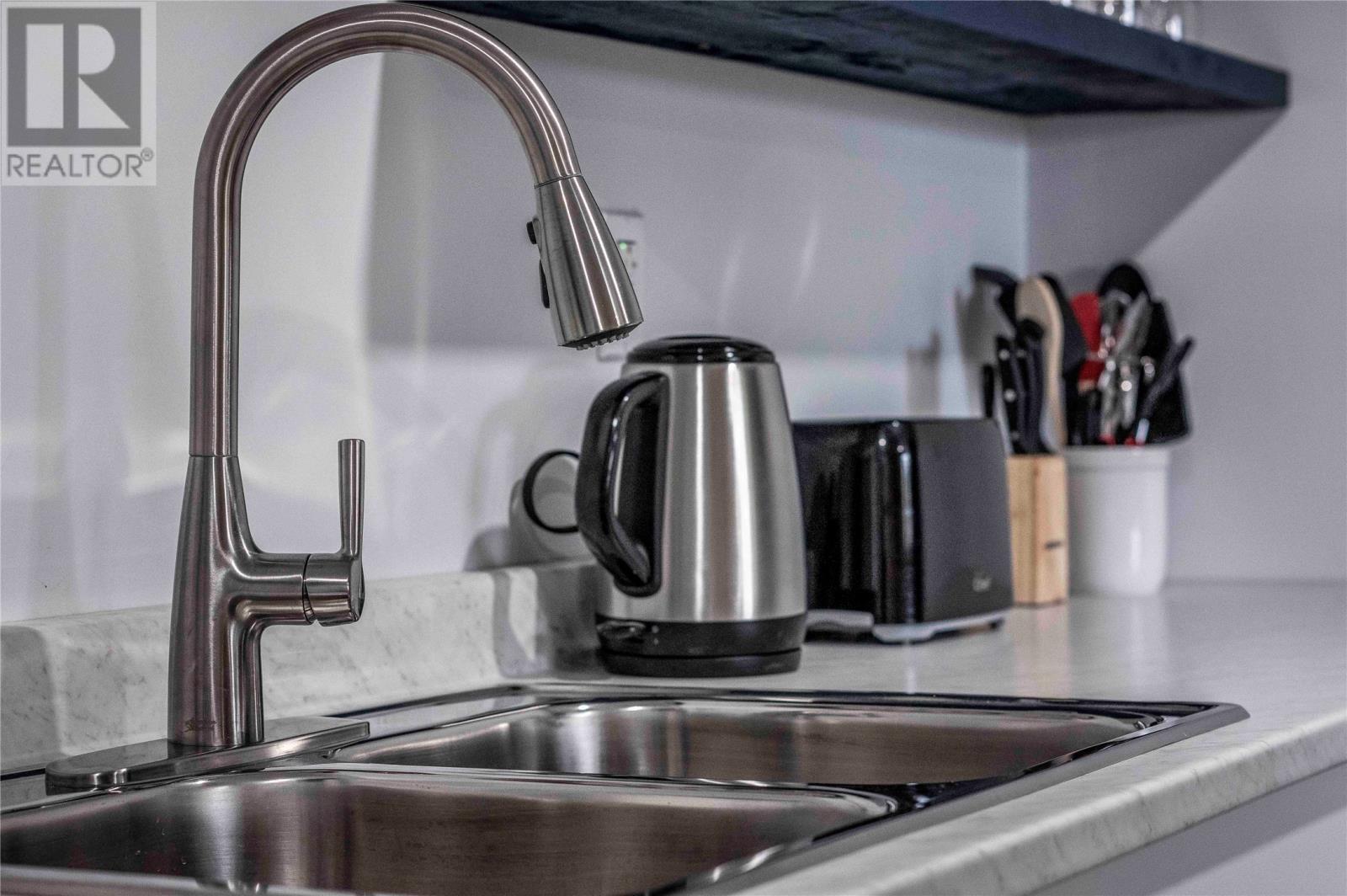 58 Front Road, Dildo, NL - Indoor Photo Showing Kitchen With Double Sink