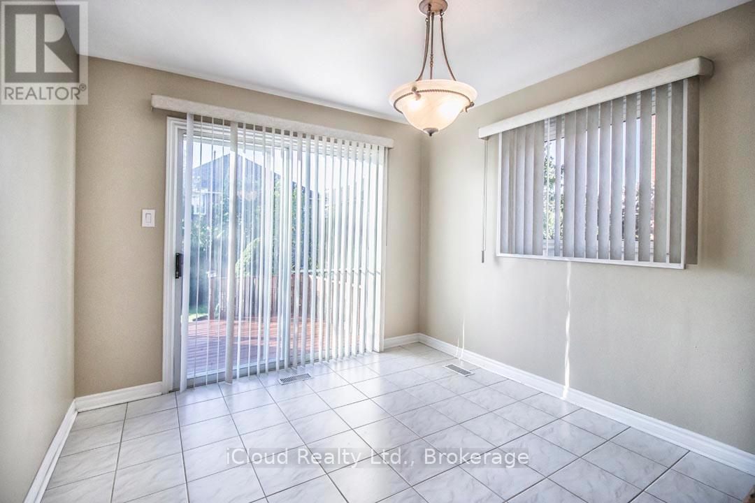 Eat-In Breakfast Area with Walkout to Wooden Deck - 2667 Wynten Way, Oakville, ON - Indoor Photo Showing Other Room