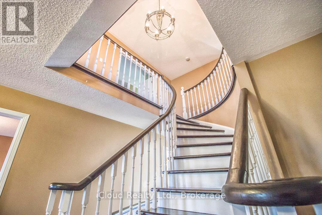 Stairs from Main Floor to Second Floor Looking Up - 2667 Wynten Way, Oakville, ON - Indoor Photo Showing Other Room