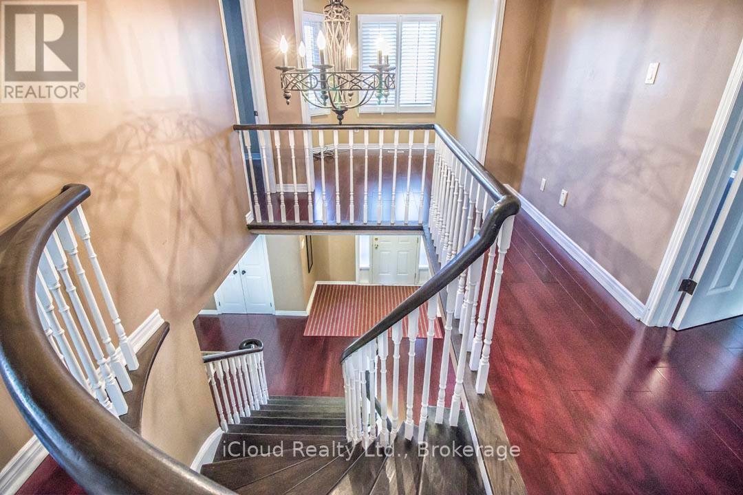 Second Floor Hallway with Chandelier - 2667 Wynten Way, Oakville, ON - Indoor Photo Showing Other Room