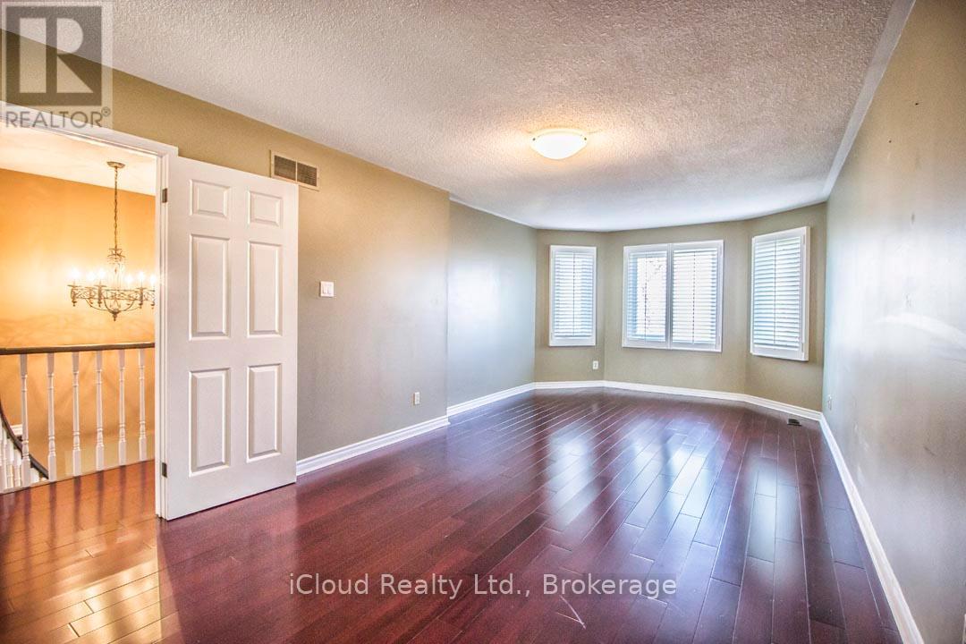 Primary Bedroom with California Shutters - 2667 Wynten Way, Oakville, ON - Indoor Photo Showing Other Room
