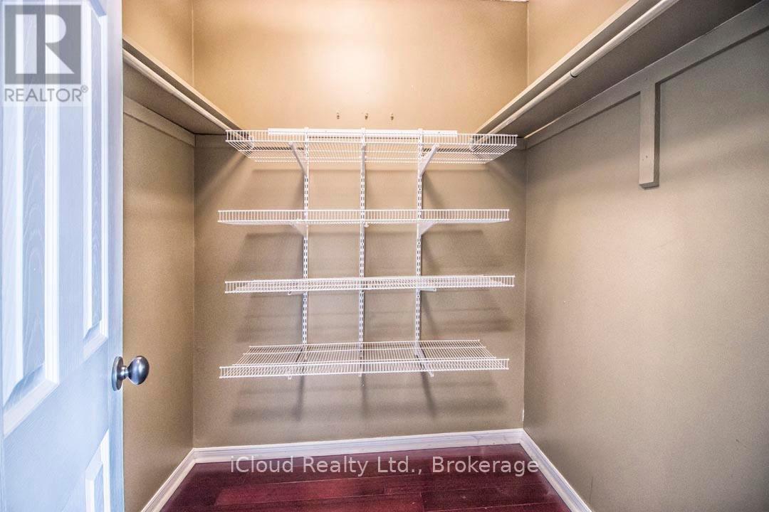 Walk-In Closet - 2667 Wynten Way, Oakville, ON - Indoor With Storage