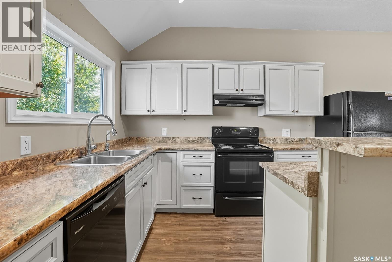 105 Main Street, Harris, SK - Indoor Photo Showing Kitchen With Double Sink