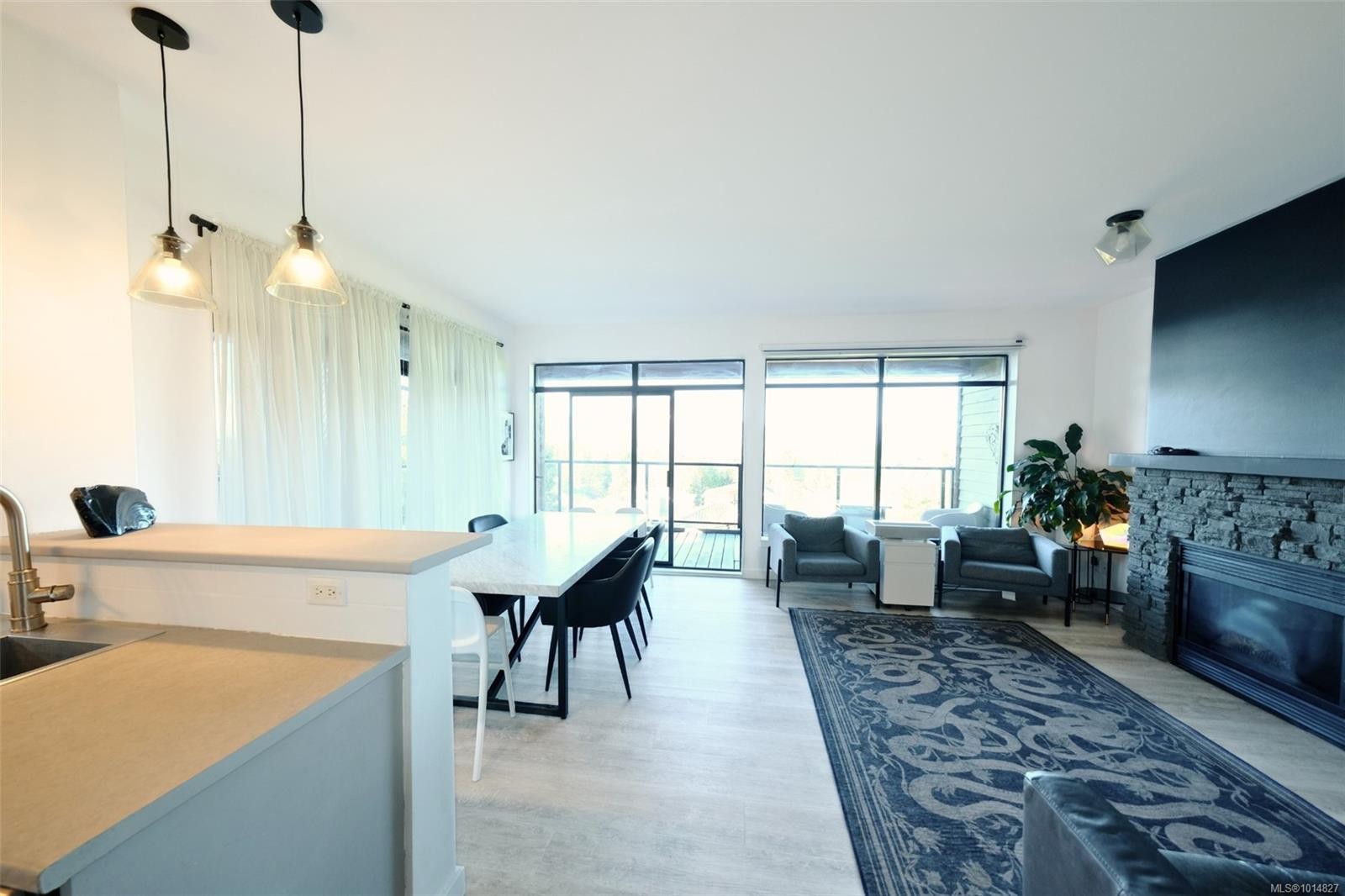 204-591 Pfeiffer Cres, Tofino, BC - Indoor Photo Showing Other Room With Fireplace